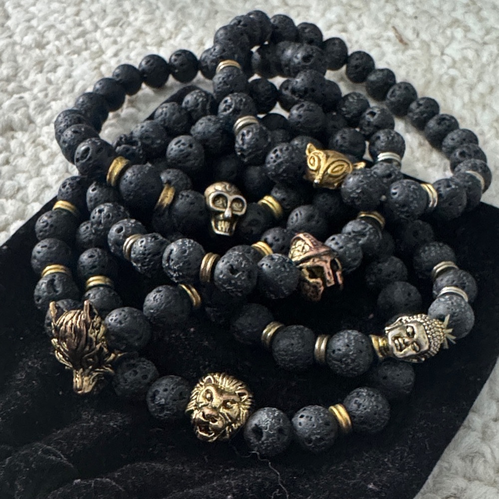 Black Lava Stone Bracelets with Gold Charm Bead